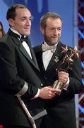 25 November 2005; Brian Dooher, from Tyrone, is presented with his Vodafone All-Star award by Sean Kelly, President of the GAA, at the 2005 Vodafone GAA All-Star Awards. Citywest Hotel, Dublin. Picture credit: Ray McManus / SPORTSFILE