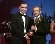 25 November 2005; Ryan McMenamin, from Tyrone, is presented with his Vodafone All-Star award by Sean Kelly, President of the GAA, at the 2005 Vodafone GAA All-Star Awards. Citywest Hotel, Dublin. Picture credit: Brendan Moran / SPORTSFILE