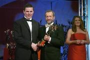 25 November 2005; Conor Gormley, from Tyrone, is presented with his Vodafone All-Star award by Sean Kelly, President of the GAA, at the 2005 Vodafone GAA All-Star Awards. Citywest Hotel, Dublin. Picture credit: Brendan Moran / SPORTSFILE