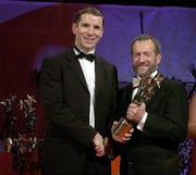 25 November 2005; Paul McGrane, from Armagh, is presented with his Vodafone All-Star award by Sean Kelly, President of the GAA, at the 2005 Vodafone GAA All-Star Awards. Citywest Hotel, Dublin. Picture credit: Brendan Moran / SPORTSFILE