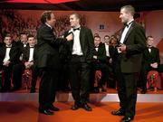 25 November 2005; Cork hurling All-Stars Ben O'Connor, centre and Jerry O'Connor are interviewed by RTE's Marty Morrissey at the 2005 Vodafone GAA All-Star Awards. Citywest Hotel, Dublin. Picture credit: Brendan Moran / SPORTSFILE