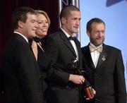 25 November 2005; Stephen O'Neill, of Tyrone, is presented with the Footballer of the Year by Teresa Elder, Chief Executive, Vodafone Ireland, Noel Dempsey, TD, Minister for Communications, Marine and Natural Resources and Sean Kelly, President of the GAA, at the 2005 Vodafone GAA All-Star Awards. Citywest Hotel, Dublin. Picture credit: Ray McManus / SPORTSFILE