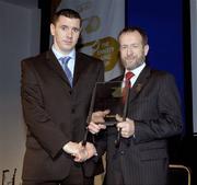 26 November 2005; Fergus McMahon, London, is presented with his Nicky Rackard Cup 'Hurling Champion 15' award by GAA President Sean Kelly. Nicky Rackard and Christy Ring Cup Awards. Croke Park, Jones Road, Dublin. Picture credit: Ray McManus / SPORTSFILE