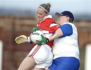 27 November 2005; Annette O'Toole Duffy, Donaghmoyne, is tackled by the Ballyboden St. Enda's goalkeeper Suzanne Hughes. Ladies Club All-Ireland Senior Football Championship Final, Ballyboden St. Enda's v Donaghmoyne, County Grounds, Drogheda, Co. Louth. Picture credit: Ray McManus / SPORTSFILE