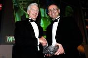 27 November 2005; Tony Mannion, left, is presented with the PFAI Merit award by Fran Gavin, PFAI General Secretary, at the 2005 PFAI Awards. Burlington Hotel, Dublin. Picture credit: David Maher / SPORTSFILE