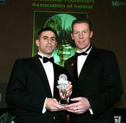27 November 2005; Kieran O'Reilly, left, Cobh Ramblers, is presented with the First Division player of the year award by Stephen McGuinness, Chairman PFAI, at the 2005 PFAI Awards. Burlington Hotel, Dublin. Picture credit: David Maher / SPORTSFILE