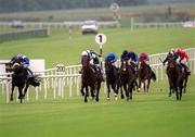 22 May 1999; Saffron Waldon, far right, with Oliver Peslier up, extreme right, front, races alongside eventual second place Enrigue, with Kieran Fallon up, and eventual third place Lucky Legend, second right, on his way to winning the Irish 2,000 Guineas at Curragh Races, Co. Kildare. Photo by Ray McManus/Sportsfile