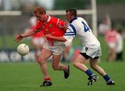 23 May 1999; Aidan Dorgan of Cork in action against Mattie Kiely of Waterford during the Bank of Ireland Munster Senior Football Championship Quarter-Final match between Waterford and Cork at Fraher Field in Dungarvan, Waterford. Photo by Ray McManus/Sportsfile