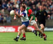 29 May 1999; Brian McCabe of New York in action against James Horan of Mayo during the Bank of Ireland Connacht Senior Football Championship Quarter-Final match between Mayo and New York at MacHale Park in Castlebar, Mayo. Photo by Brendan Moran/Sportsfile