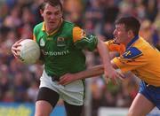 30 May 1999; Colin McGlynn of Leitrim in action against Denis Gavin of Roscommon during the Bank of Ireland Connacht Senior Football Championship at Páirc Sheáin Mhic Dhiarmada in Carrick on Shannon, Leitrim. Photo by Brendan Moran/Sportsfile