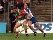 29 May 1999; Colm McManaman of Mayo, in action against Pat Mahoney of New York during the Bank of Ireland Connacht Senior Football Championship Quarter-Final match between Mayo and New York at MacHale Park in Castlebar, Mayo. Photo by Brendan Moran/Sportsfile
