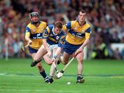 14 September 1997; Conor Gleeson of Tipperary in action against Conor Clancy, left, and Ollie Baker of Clare during the Guinness All-Ireland Senior Hurling Championship Final match between Clare and Tipperary at Croke Park in Dublin. Photo by Matt Browne/Sportsfile