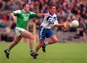 30 May 1999; Damien Freeman of Monaghan in action against Tony Collins of Fermanagh during the Bank of Ireland Ulster Senior Football Championship Preliminary Round match between Monaghan and Fermanagh at St Tiernach's Park in Clones, Monaghan. Photo by Damien Eagers/Sportsfile