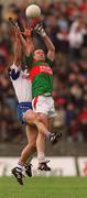 29 May 1999; David Brady of Mayo, in action against  Gary Dowd of New York during the Bank of Ireland Connacht Senior Football Championship Quarter-Final match between Mayo and New York at MacHale Park in Castlebar, Mayo. Photo by Brendan Moran/Sportsfile