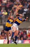 2 May 1999; Colin Lynch of Clare in action against Declan Ryan of Tipperary during the Church & General National Hurling League Division 1 Semi-Final match between Clare and Tipperary at the Gaelic Grounds in Limerick. Photo by Damien Eagers/Sportsfile