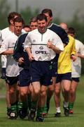 1 June 1999; Denis Irwin leading his team-mates in a jog during a Republic of Ireland training session at the AUL Complex in Clonshaugh, Dublin. Photo by Brendan Moran/Sportsfile