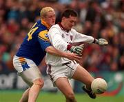 30 May 1999; Westmeath goalkeeper Dermot Ryan in action against Niall Sheridan of Longford during the Bank of Ireland Leinster Senior Football Championship 2nd Preliminary Round match between Westmeath and Longford at Cusack Park in Mullingar, Westmeath. Photo by Aoife Rice/Sportsfile