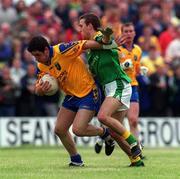 30 May 1999; Francie Grehan of Roscommon in action against Colin Regan of Leitrim during the Bank of Ireland Connacht Senior Football Championship at Páirc Sheáin Mhic Dhiarmada in Carrick on Shannon, Leitrim. Photo by Brendan Moran/Sportsfile