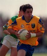 30 May 1999; Francie Grehan of Roscommon gets past James Phelan of Leitrim during the Bank of Ireland Connacht Senior Football Championship at Páirc Sheáin Mhic Dhiarmada in Carrick on Shannon, Leitrim. Photo by Brendan Moran/Sportsfile