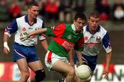 29 May 1999; Ger Brady of Mayo, in action against Seán Teague, right, and Neville Dunne of New York during the Bank of Ireland Connacht Senior Football Championship Quarter-Final match between Mayo and New York at MacHale Park in Castlebar, Mayo. Photo by Brendan Moran/Sportsfile