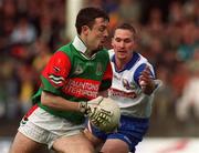 29 May 1999; Ger Brady of Mayo in action against Seán Teague of New York during the Bank of Ireland Connacht Senior Football Championship Quarter-Final match between Mayo and New York at MacHale Park in Castlebar, Mayo. Photo by Brendan Moran/Sportsfile