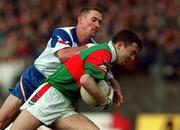 29 May 1999; Ger Brady of Mayo in action against Neville Dunne of New York during the Bank of Ireland Connacht Senior Football Championship Quarter-Final match between Mayo and New York at MacHale Park in Castlebar, Mayo. Photo by Brendan Moran/Sportsfile