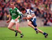 30 May 1999; Joe Coyle of Monaghan in action against Liam McBarron of Fermanagh during the Bank of Ireland Ulster Senior Football Championship Preliminary Round match between Monaghan and Fermanagh at St Tiernach's Park in Clones, Monaghan. Photo by Damien Eagers/Sportsfile