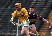 22 May 1999; John Healy of Kerry in action against Paul Shelley of Tipperary during the Guinness Munster Senior Hurling Championship Quarter-Final match between Tipperary and Kerry at Semple Stadium in Thurles, Tipperary. Photo by Ray Lohan/Sportsfile