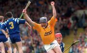 4 July 1993; John Leahy of Tipperary celebrates scoring his side's first goal as Brian Lohan of Clare looks on during the Munster Senior Hurling Championship Final match between Clare and Tipperary at the Gaelic Grounds in Limerick. Photo by Ray McManus/Sportsfile