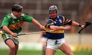 22 May 1999; John Leahy of Tipperary in action against Tom Cronin of Kerry during the Guinness Munster Senior Hurling Championship Quarter-Final match between Tipperary and Kerry at Semple Stadium in Thurles, Tipperary. Photo by Brendan Moran/Sportsfile