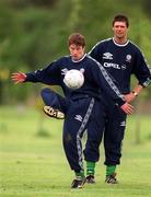 25 May 1999; Kenny Cunningham with Niall Quinn, behind, during a Republic of Ireland training session at the Nuremore Hotel in Carrickmacross, Monaghan. Photo by Brendan Moran/Sportsfile