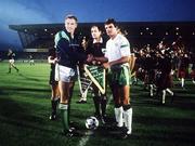 11 October 1989; Team captains John McClelland of Northern Ireland, left, and Kevin Moran of Republic of Ireland shake hands alongside referee Pietro D'Elia before the 1990 FIFA World Cup Qualifier match between Republic of Ireland and Northern Ireland at Lansdowne Road in Dublin. Photo by Ray McManus/Sportsfile