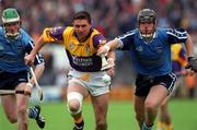 30 May 1999; Larry O'Gorman of Wexford in action against Shane Ryan of Dublin, right, during the Guinness Leinster Senior Hurling Championship Quarter-Final match between Dublin and Wexford at Nowlan Park in Kilkenny. Photo by Ray Lohan/Sportsfile