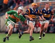 22 May 1999; Liam Cahill of Tipperary in action against Ian Brick of Kerry during the Guinness Munster Senior Hurling Championship Quarter-Final match between Tipperary and Kerry at Semple Stadium in Thurles, Tipperary. Photo by Ray Lohan/Sportsfile