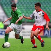 29 May 1999; Mark Kennedy of Republic of Ireland in action against Aaron Hughes of Northern Irelandd during the International Friendly match between Republic of Ireland and Northern Ireland at Lansdowne Road in Dublin. Photo by Damien Eagers/Sportsfile