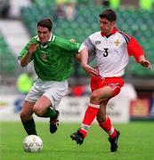 29 May 1999; Mark Kennedy of Republic of Ireland in action against Aaron Hughes of Northern Ireland during the International Friendly match between Republic of Ireland and Northern Ireland at Lansdowne Road in Dublin. Photo by Damien Eagers/Sportsfile