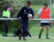 25 May 1999; Niall Quinn, centre, and Keith O'Neill move goalposts during a Republic of Ireland training session at the Nuremore Hotel in Carrickmacross, Monaghan. Photo by Brendan Moran/Sportsfile