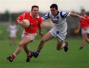 23 May 1999; Noel Twomey of Cork in action against David Ryan of Waterford during the Munster Junior Football Championship match at Fraher Field in Dungarvan, Waterford. Photo by Aoife Rice/Sportsfile
