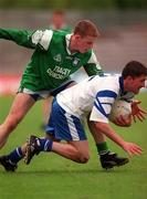 30 May 1999; Padraig McKenna of Monaghan in action against Tom Brewster of Fermanagh during the Bank of Ireland Ulster Senior Football Championship Preliminary Round match between Monaghan and Fermanagh at St Tiernach's Park in Clones, Monaghan. Photo by Damien Eagers/Sportsfile