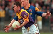 16 May 1999; Pat Forde of Wexford in action against Niall Sheridan of Longford during the Bank of Ireland Leinster Senior Football Championship Preliminary Round Replay match between Longford and Wexford at Pearse Park in Longford. Photo by David Maher/Sportsfile