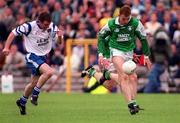 30 May 1999; Paul Brewster of Fermanagh in action against Peter Duffy of Monaghan during the Bank of Ireland Ulster Senior Football Championship Preliminary Round match between Monaghan and Fermanagh at St Tiernach's Park in Clones, Monaghan. Photo by Damien Eagers/Sportsfile