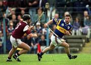 16 May 1999; Paul Shelley of Tipperary in action against Brian Feeney of Galway during the Church & General National Hurling League Division 1 Final match between Galway and Tipperary at Cusack Park in Ennis, Clare. Photo by Ray McManus/Sportsfile