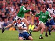 30 May 1999; Peter Duffy of Monaghan in action against Paul Brewster of Fermanagh during the Bank of Ireland Ulster Senior Football Championship Preliminary Round match between Monaghan and Fermanagh at St Tiernach's Park in Clones, Monaghan. Photo by Damien Eagers/Sportsfile