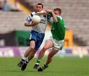 30 May 1999; Peter Duffy of Monaghan in action against Shaun Burns of Fermanagh during the Bank of Ireland Ulster Senior Football Championship Preliminary Round match between Monaghan and Fermanagh at St Tiernach's Park in Clones, Monaghan. Photo by Damien Eagers/Sportsfile