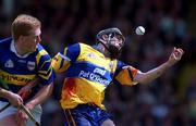6 June 1999; Seán McMahon of Clare in action against Declan Ryan of Tipperary during the Guinness Munster Senior Hurling Championship Semi-Final match between Clare and Tipperary at Páirc Uí Chaoimh in Cork. Photo by Ray McManus/Sportsfile