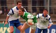 30 June 1999; Shane McDermott of Fermanagh in action against Edwin Murphy of Monaghan during the Bank of Ireland Ulster Senior Football Championship Preliminary Round match between Monaghan and Fermanagh at St Tiernach's Park in Clones, Monaghan. Photo by Damien Eagers/Sportsfile