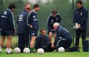 2 June 1999; Shay Given is attended to by physio Mick Byrne, as concerned team-mates look on, during a Republic of Ireland training session at the AUL Complex in Clonshaugh, Dublin. Photo by Ray McManus/Sportsfile