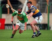 22 May 1999; Tom Cronin of Kerry gets past Paul Shelley of Tipperary during the Guinness Munster Senior Hurling Championship Quarter-Final match between Tipperary and Kerry at Semple Stadium in Thurles, Tipperary. Photo by Brendan Moran/Sportsfile