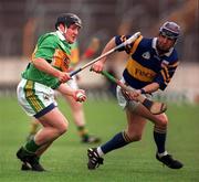 22 May 1999; Tom Cronin of Kerry in action against John Leahy of Tipperary during the Guinness Munster Senior Hurling Championship Quarter-Final match between Tipperary and Kerry at Semple Stadium in Thurles, Tipperary. Photo by Brendan Moran/Sportsfile