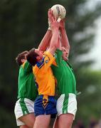 30 May 1999; Tom Ryan of Roscommon in action against Jason Ward, left, and Brendan Guckian of Leitrim during the Bank of Ireland Connacht Senior Football Championship at Páirc Sheáin Mhic Dhiarmada in Carrick on Shannon, Leitrim. Photo by Brendan Moran/Sportsfile